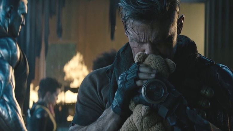 Cable clutching his daughter's teddy bear