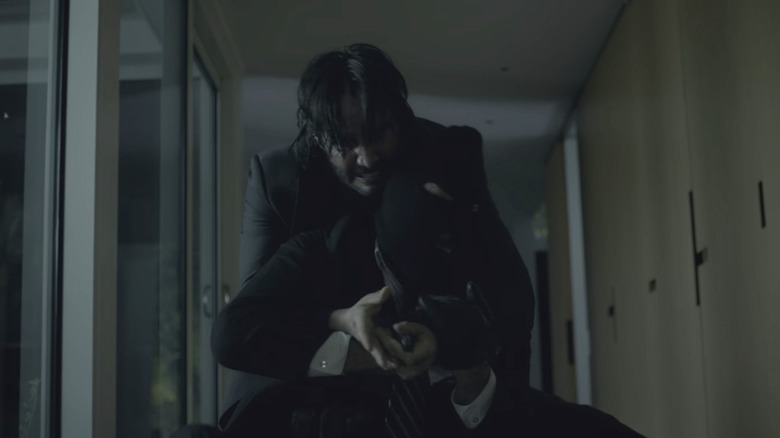 John Wick killing apartment intruder