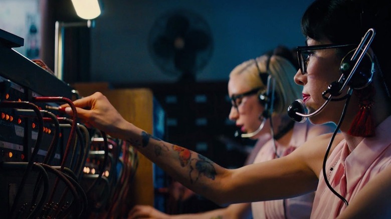 Operators using a switchboard in John Wick 