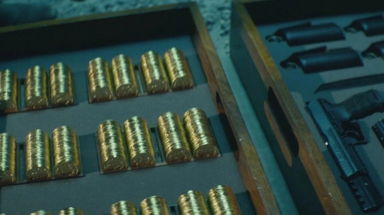 John Wick's gold coins and firearms