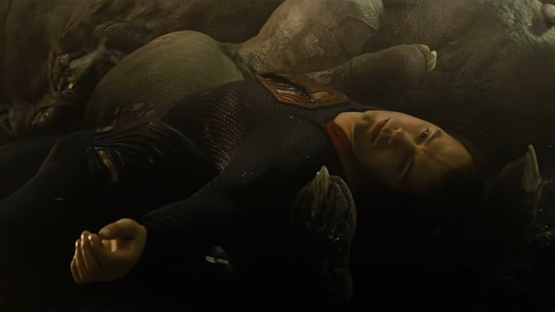 Superman's body lying in rubble