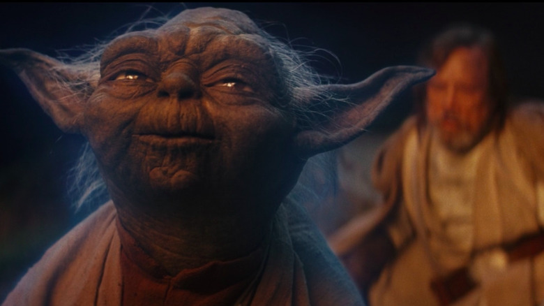 Yoda looking up smiling