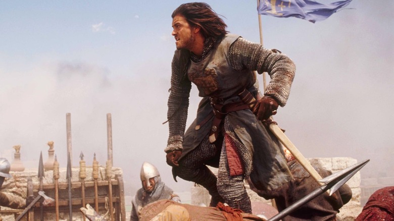 Orlando Bloom preparing to leap