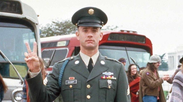 Forrest Gump gives the peace sign