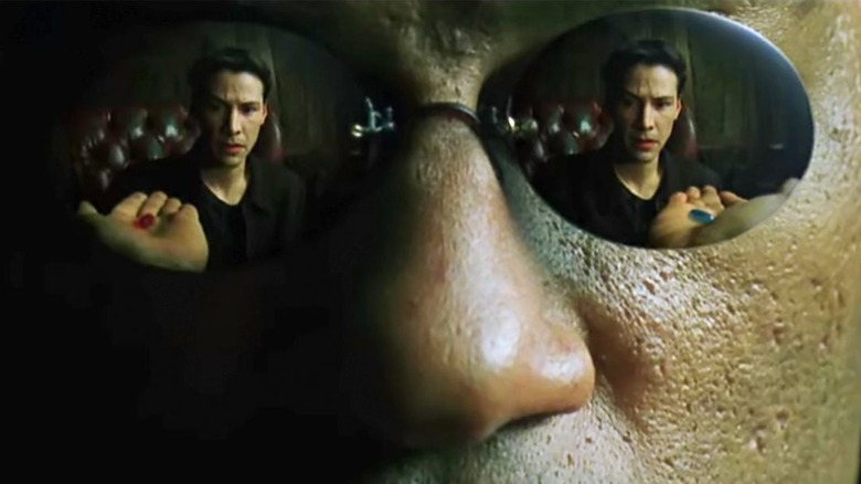 Morpheus offering Neo the Red Pill or Blue Pill