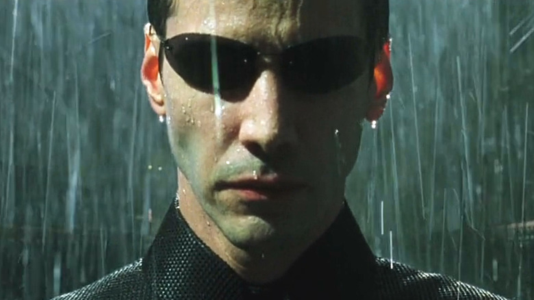 Neo in the rain in Matrix