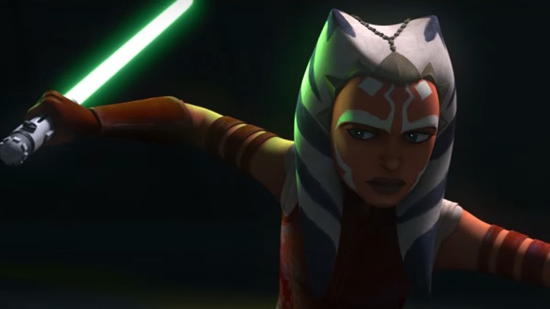 Ahsoka on guard with lightsaber