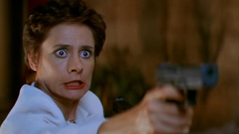 Mrs. Loomis with a gun