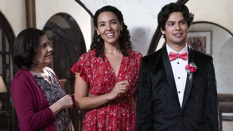 Xolo Maridueña as Miguel Diaz in a tuxedo in Cobra Kai