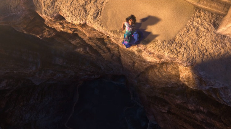 Mirabel scrambles away from cliff