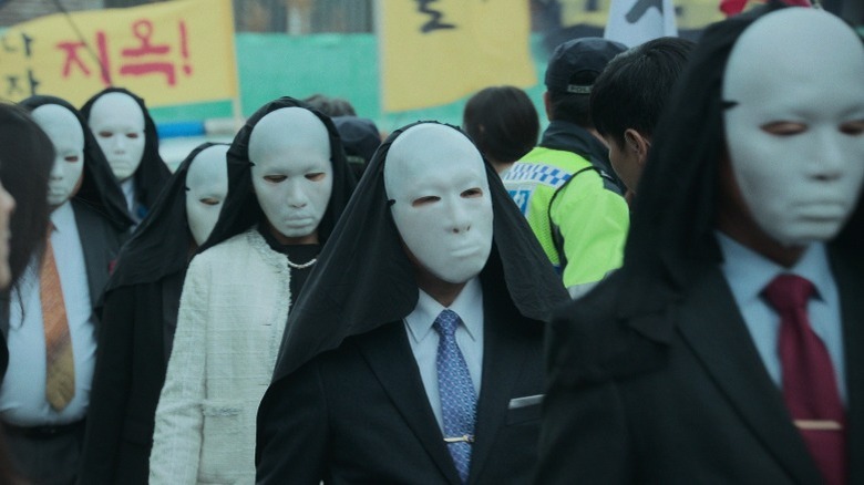 White masks marching