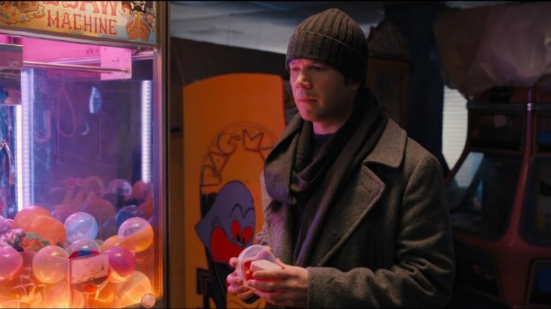 Theo holding claw game prize