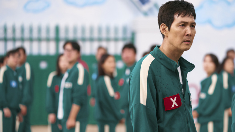 Gi-hun wears an X patch on "Squid Game" Season 2