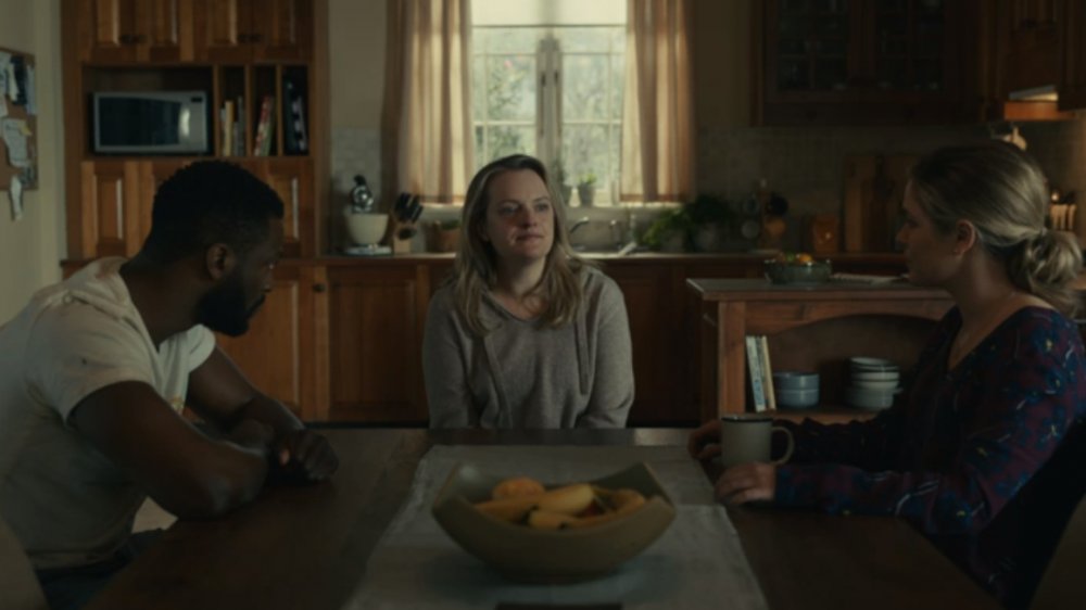 Aldis Hodge as James Lanier, Elisabeth Moss as Cecilia Kass, and Harriet Dyer as Emily Kass in The Invisible Man