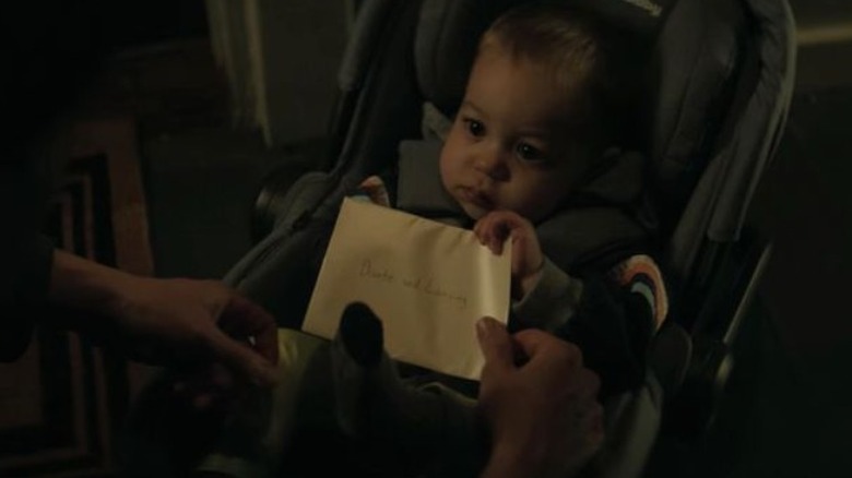 Baby Henry in a crib