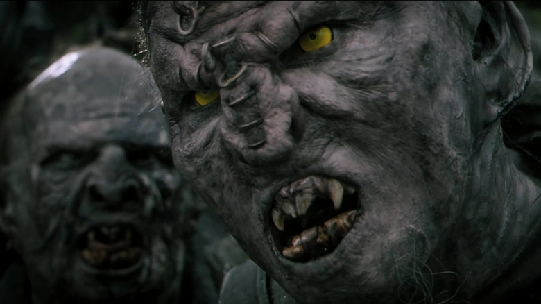 Orcs snarling in battle