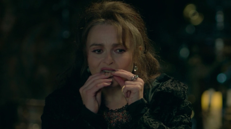 Helena Bonham Carter putting in teeth