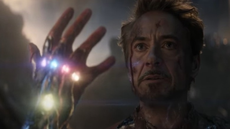 Iron Man about to snap while wearing the Infinity Gauntlet