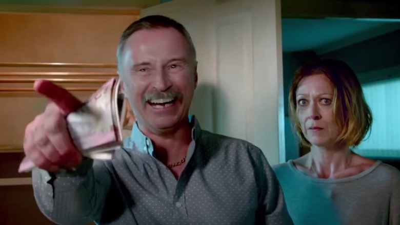 Begbie pointing and laughing