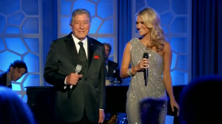 Tony Bennett and Carrie Underwood performing on stage