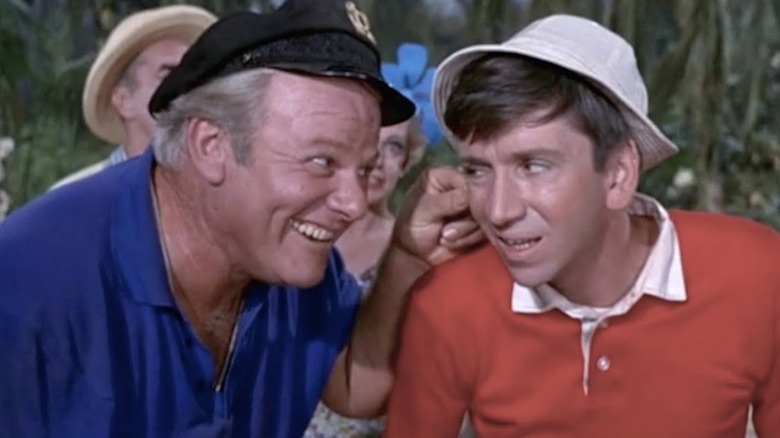 Skipper pulling Gilligan's ear