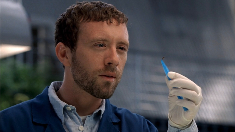 Hodgins inspecting a bug in Bones