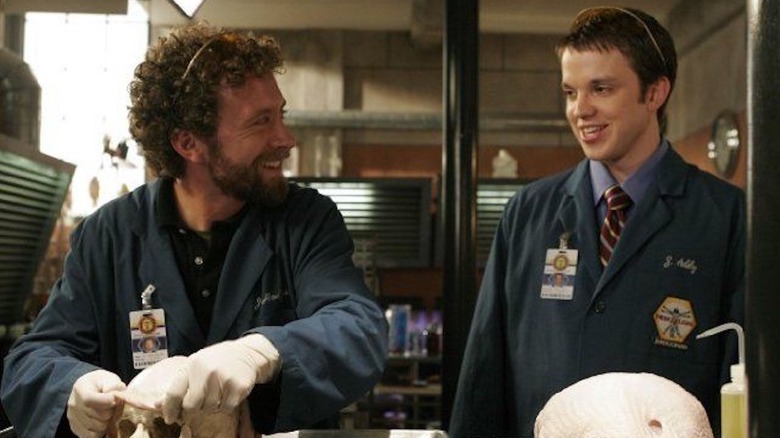 Zack laughing with Hodgins