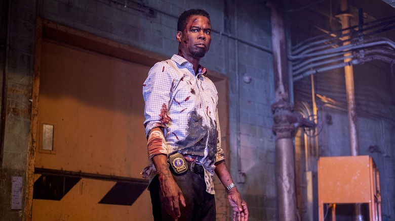 Spiral's Chris Rock looks battered