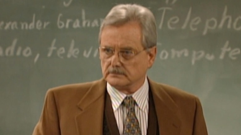 George Feeny frowning