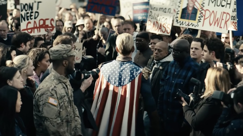 Homelander among a group of protestors on The Boys