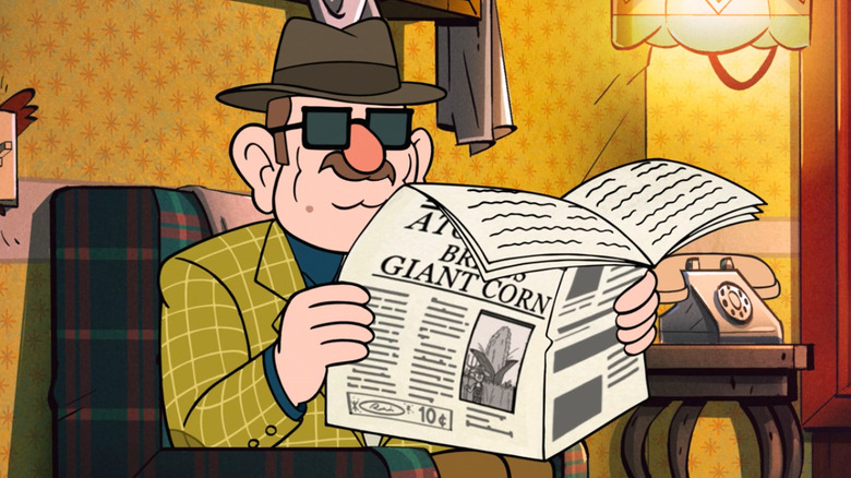 Filbrick Pines reading a newspaper 