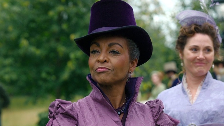 Lady Danbury smirking in purple