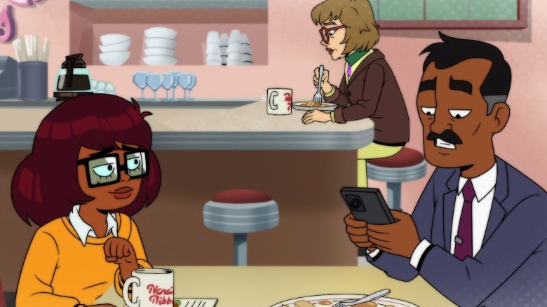 Velma and her dad dining