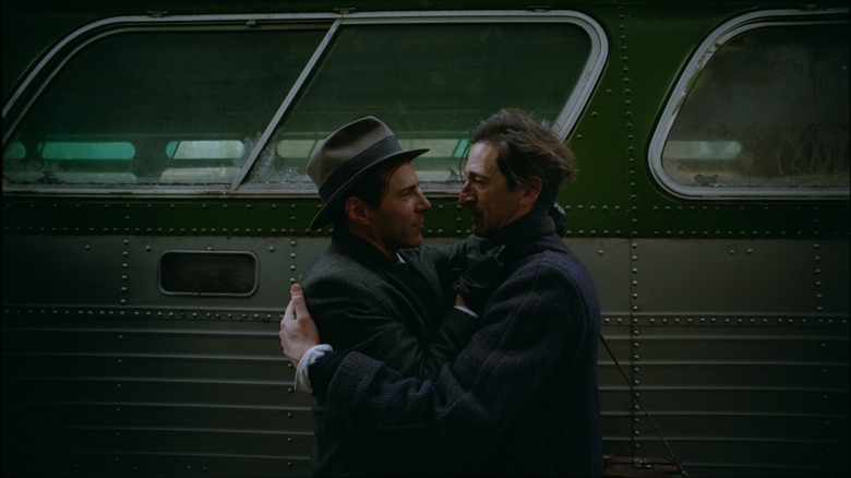 Attila and Laszlo hugging by train