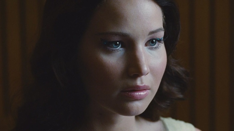 Katniss with a stoic expression