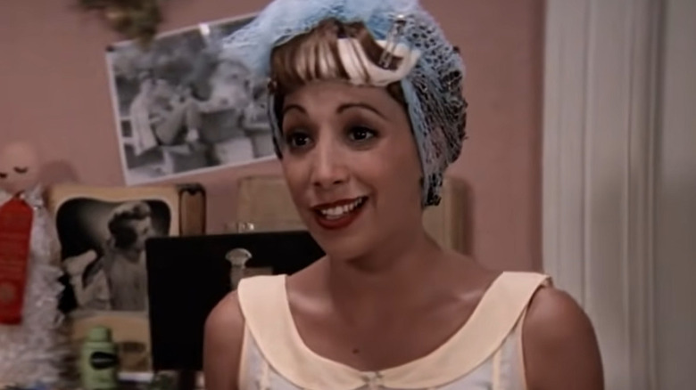 Frenchy wearing a hair net