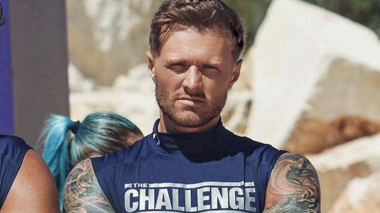 Kyle posing on set of The Challenge