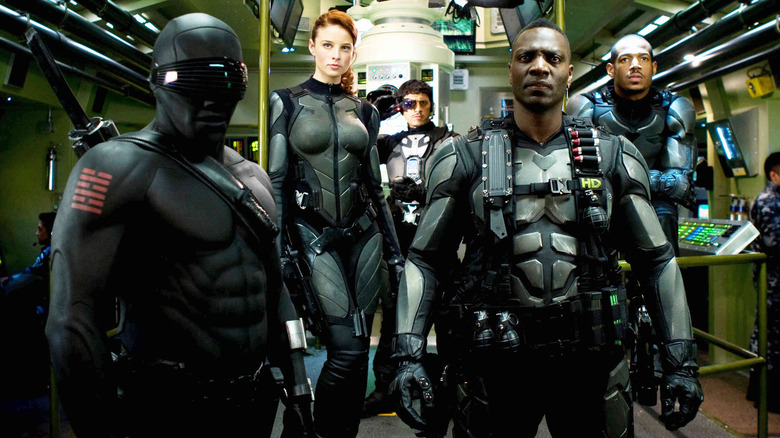 Scarlett, Snake Eyes, Ripcord, and Heavy Duty in armor