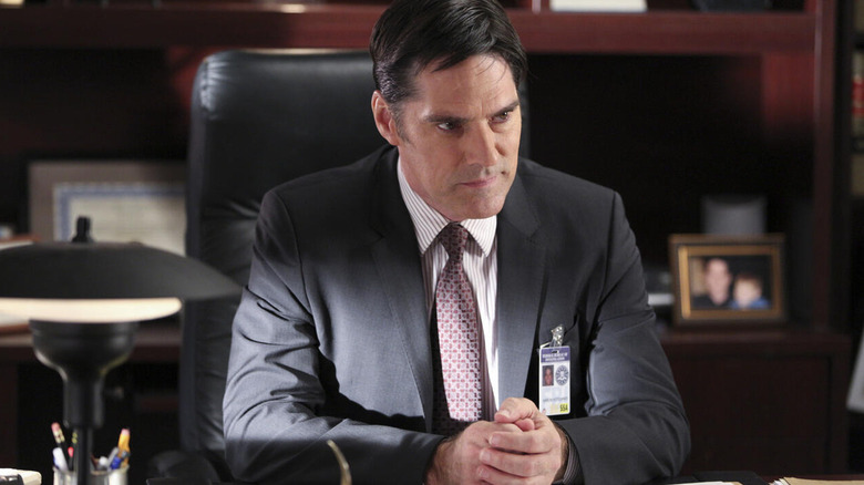 Thomas Gibson scowling