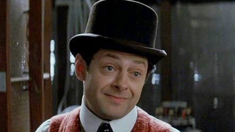 Andy Serkis Mr. Alley smiling in workshop