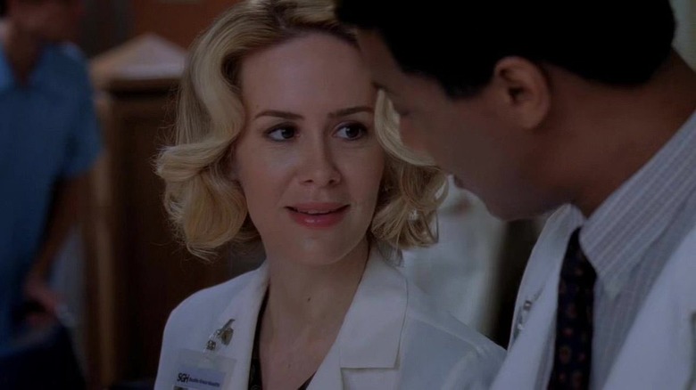 Sarah Paulson wearing lab coat