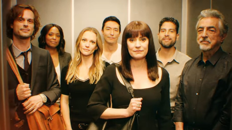 Cast of Criminal Minds smiling in elevator