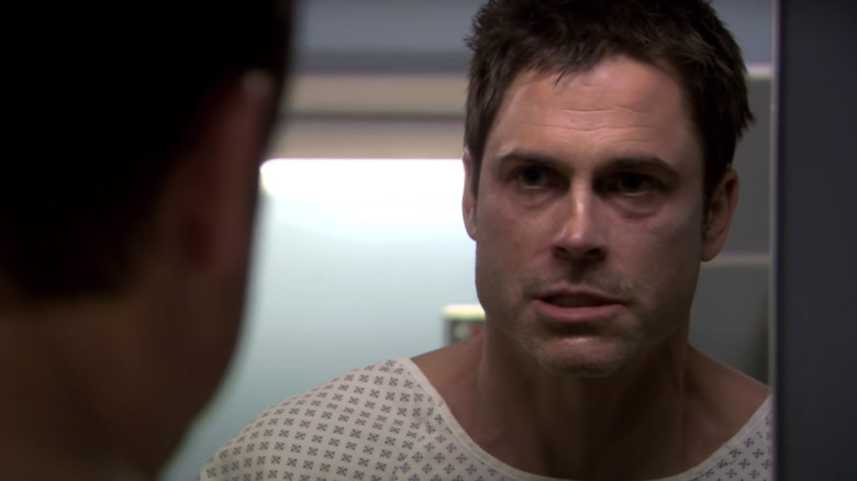 Chris Traeger staring in a mirror