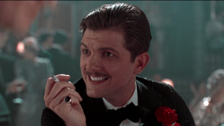 Adam Scott cigarette cheeky smile