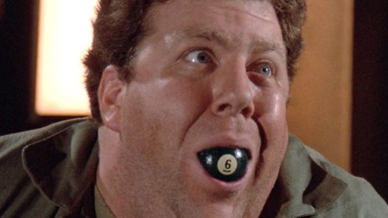 George Wendt with 6-ball in mouth