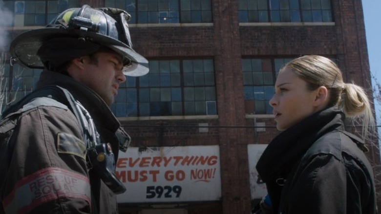 Taylor Kinney and Lauren German talking 