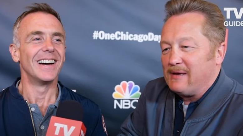 David Eigenberg and Christian Stolte smiling