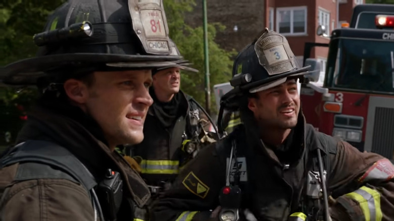 Jesse Spencer and Taylor Kinney surveying the scene