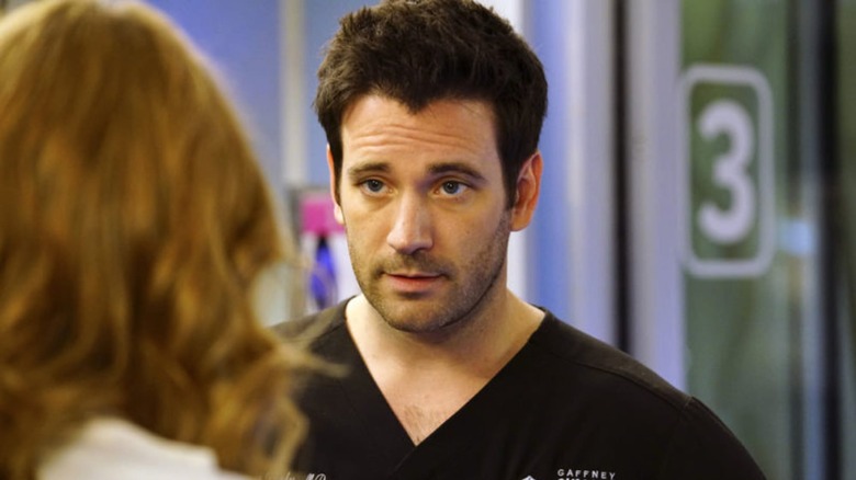 Connor Rhodes in his scrubs on Chicago Med