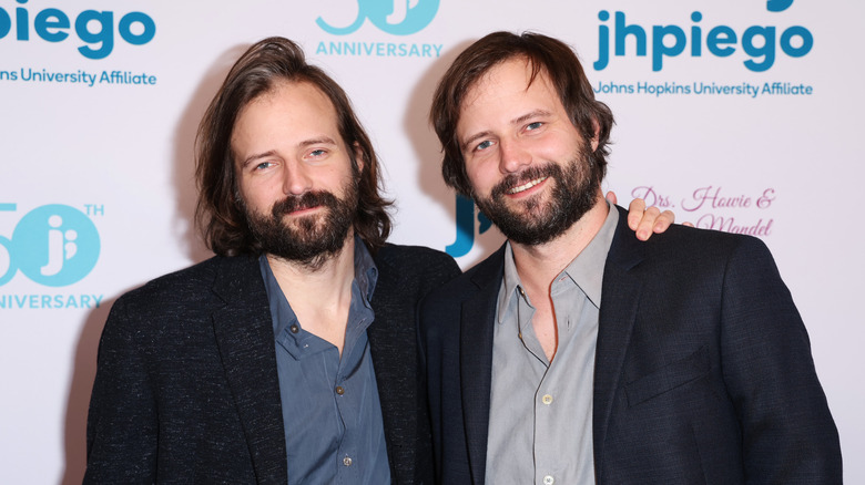 The Duffer Brothers posing for photos